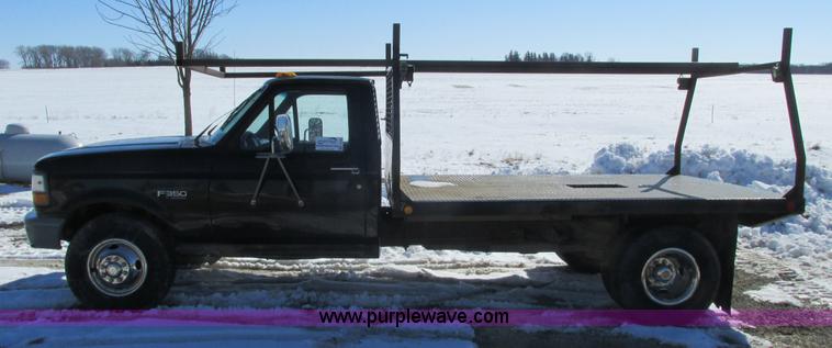 image for item I3768 1997 Ford F350 XL flatbed pickup truck