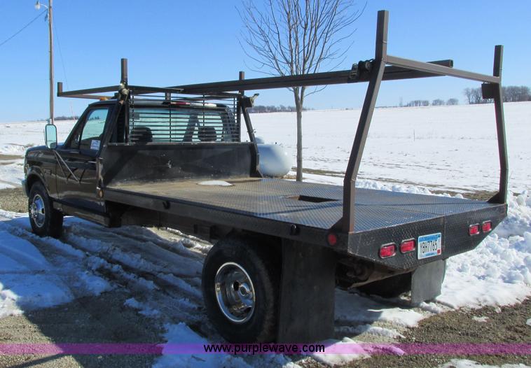 image for item I3768 1997 Ford F350 XL flatbed pickup truck