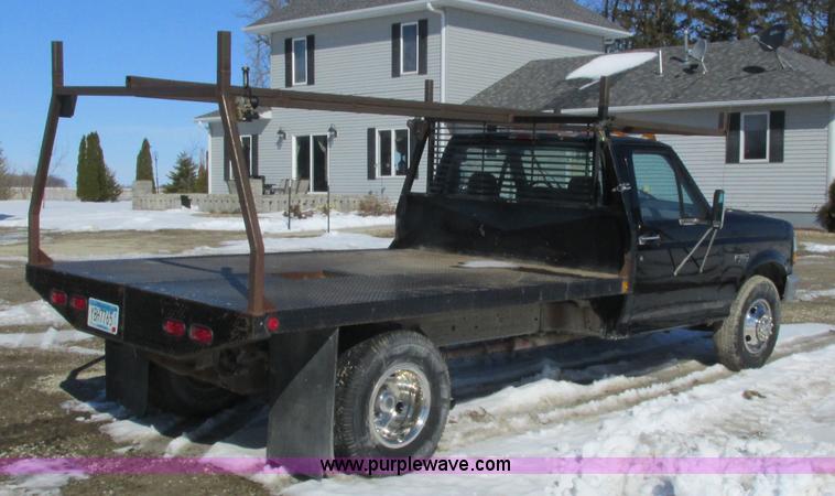 image for item I3768 1997 Ford F350 XL flatbed pickup truck