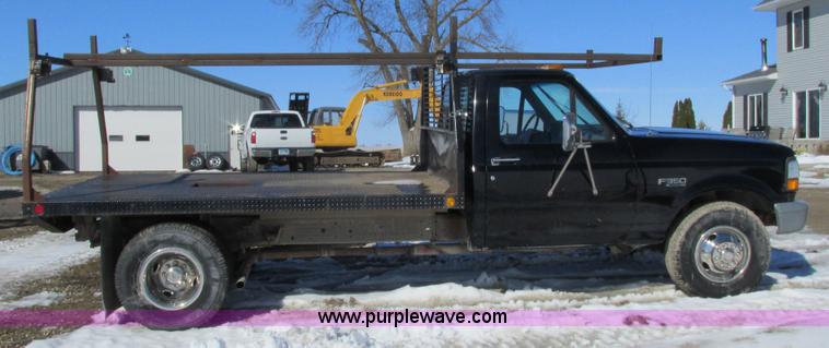 image for item I3768 1997 Ford F350 XL flatbed pickup truck
