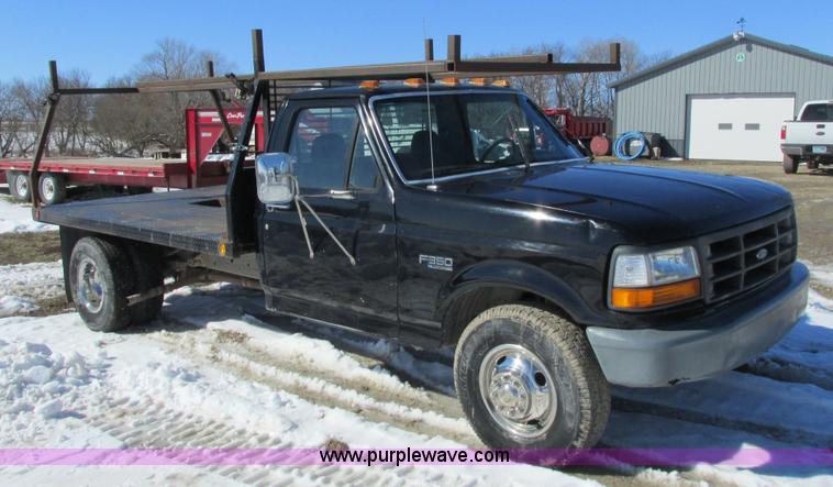 image for item I3768 1997 Ford F350 XL flatbed pickup truck