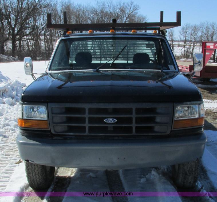 image for item I3768 1997 Ford F350 XL flatbed pickup truck