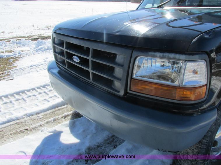 image for item I3768 1997 Ford F350 XL flatbed pickup truck