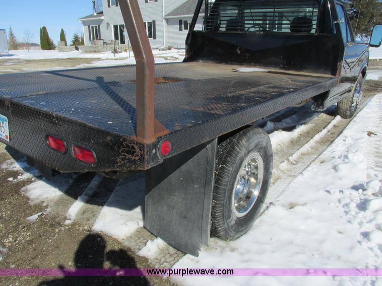 image for item I3768 1997 Ford F350 XL flatbed pickup truck