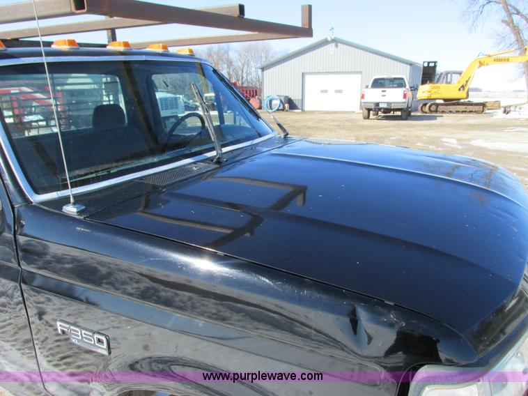 image for item I3768 1997 Ford F350 XL flatbed pickup truck