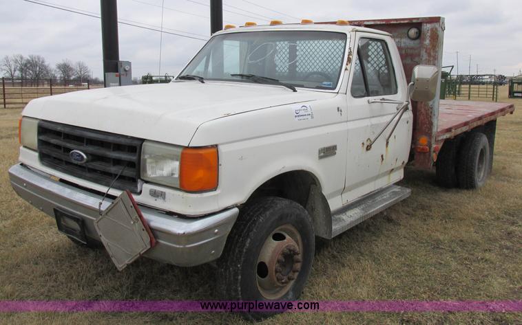 image for item K2026 1988 Ford F450 Super Duty flatbed truck
