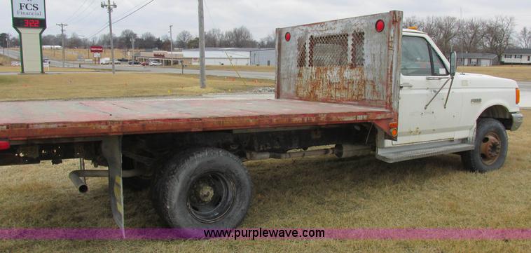 image for item K2026 1988 Ford F450 Super Duty flatbed truck