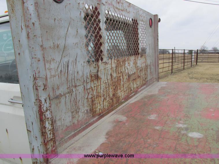 image for item K2026 1988 Ford F450 Super Duty flatbed truck