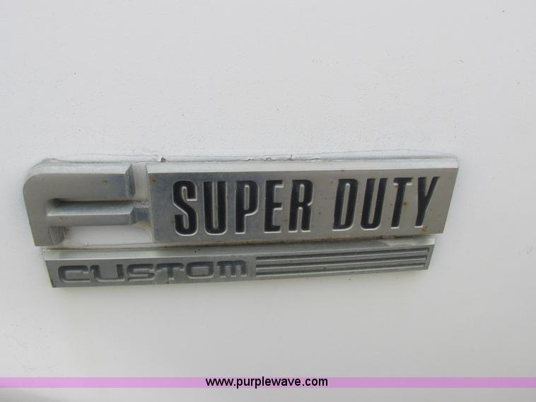 image for item K2026 1988 Ford F450 Super Duty flatbed truck