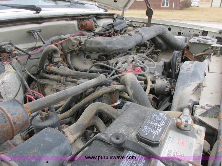 image for item K2026 1988 Ford F450 Super Duty flatbed truck