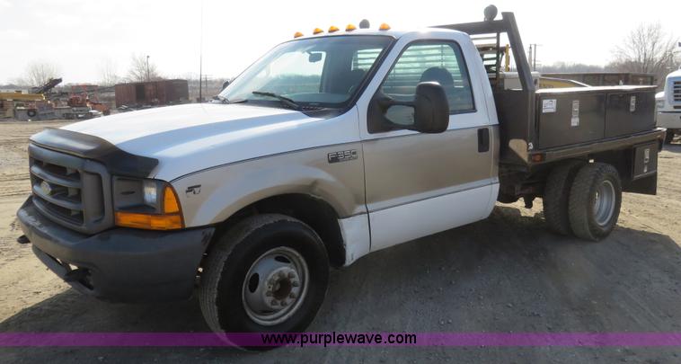 image for item K7026 2000 Ford F350 Super Duty flatbed pickup truck