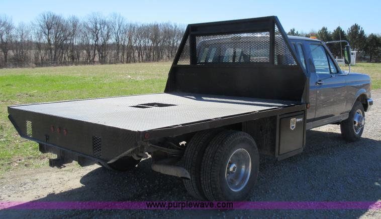 image for item Z9261 1991 Ford F350 Crew Cab flatbed pickup truck