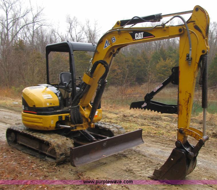 image for item F8985 2003 Caterpillar 304CR compact excavator