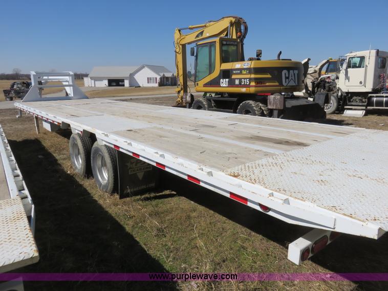 image for item K7098 2010 PJ gooseneck tilt deck trailer