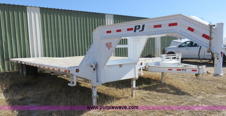 image for item K7098 2010 PJ gooseneck tilt deck trailer