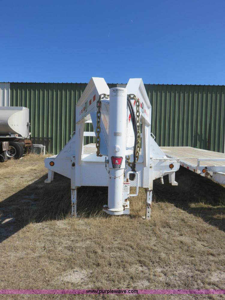 image for item K7098 2010 PJ gooseneck tilt deck trailer