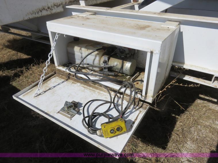 image for item K7098 2010 PJ gooseneck tilt deck trailer