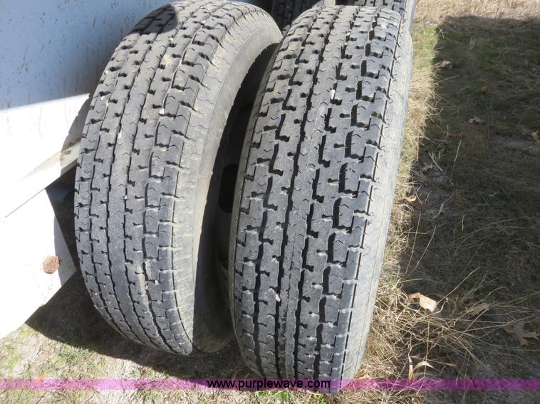 image for item K7098 2010 PJ gooseneck tilt deck trailer