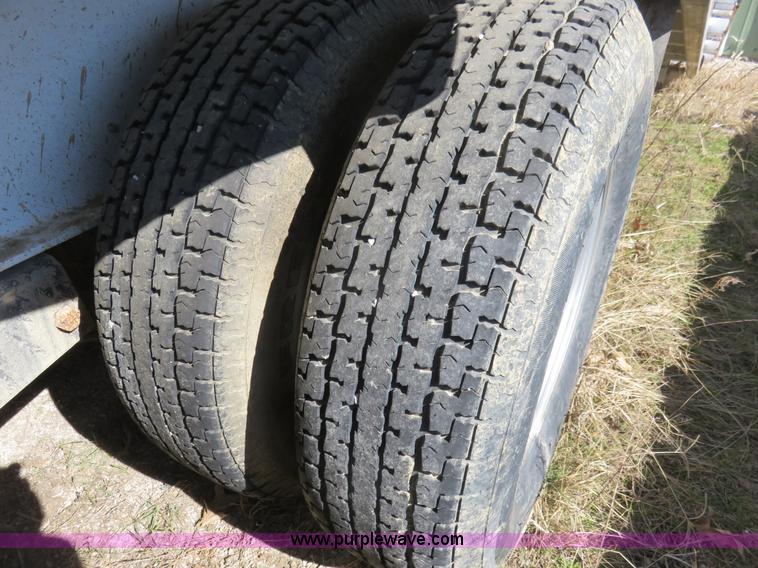 image for item K7098 2010 PJ gooseneck tilt deck trailer