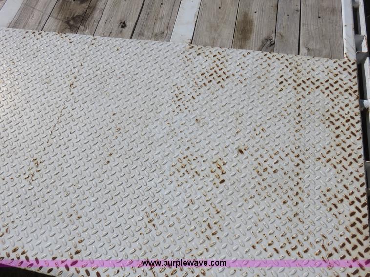 image for item K7098 2010 PJ gooseneck tilt deck trailer