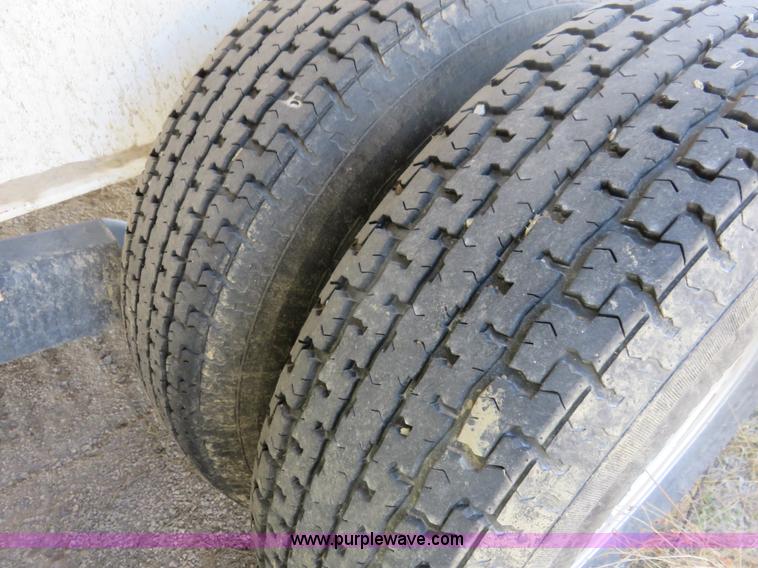 image for item K7098 2010 PJ gooseneck tilt deck trailer