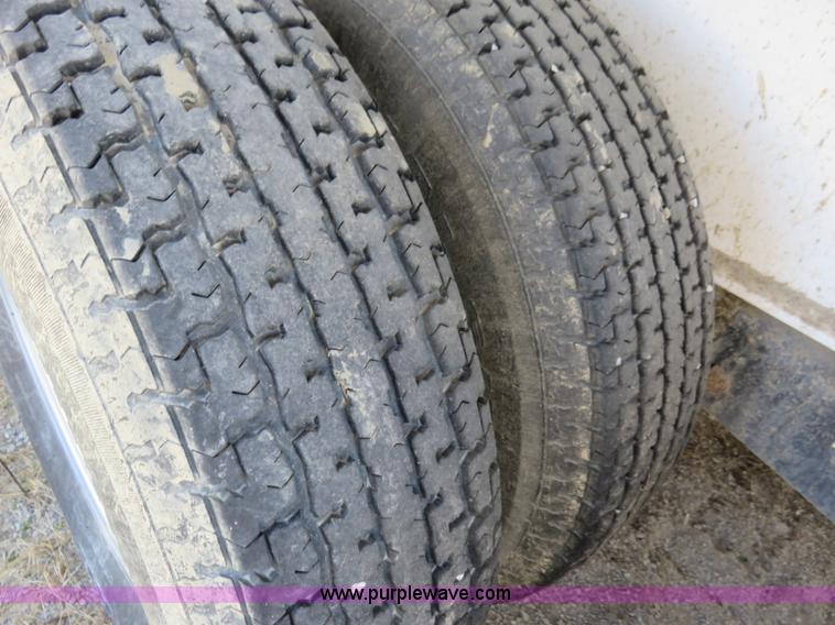 image for item K7098 2010 PJ gooseneck tilt deck trailer