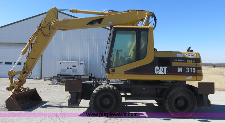 image for item K7107 2001 Caterpillar M315 rubber tire excavator