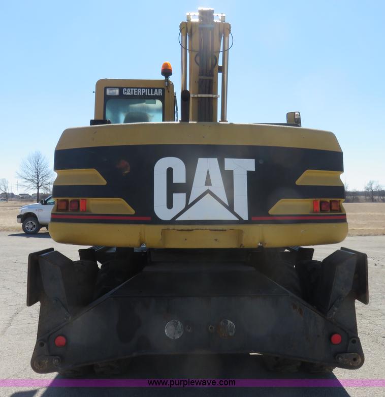 image for item K7107 2001 Caterpillar M315 rubber tire excavator