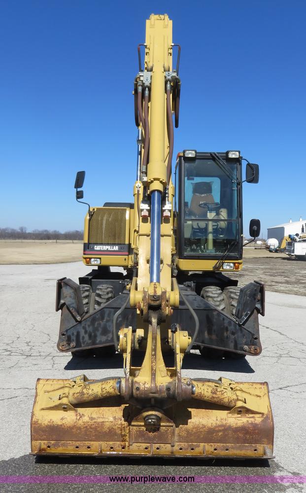 image for item K7107 2001 Caterpillar M315 rubber tire excavator