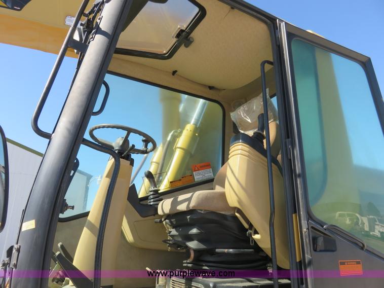 image for item K7107 2001 Caterpillar M315 rubber tire excavator