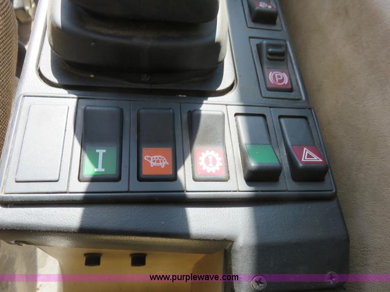 image for item K7107 2001 Caterpillar M315 rubber tire excavator