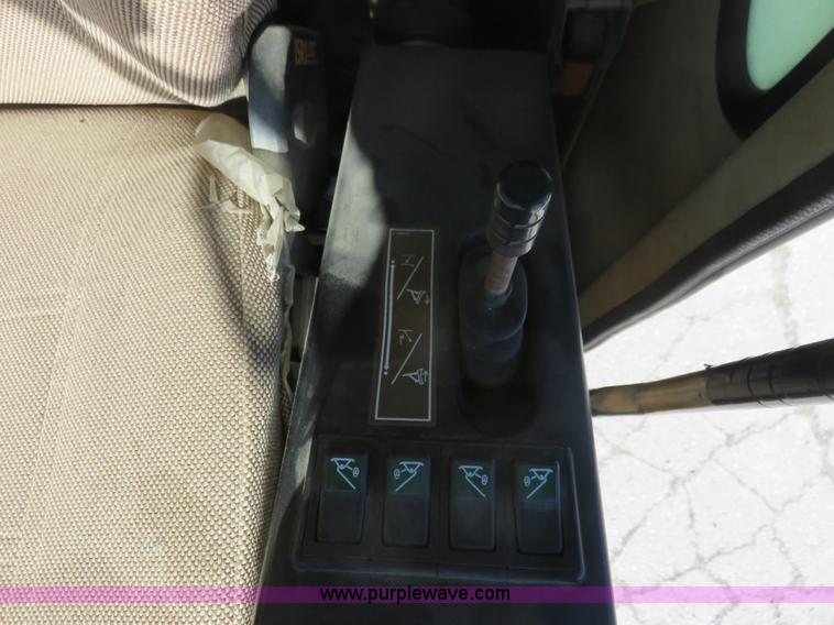 image for item K7107 2001 Caterpillar M315 rubber tire excavator