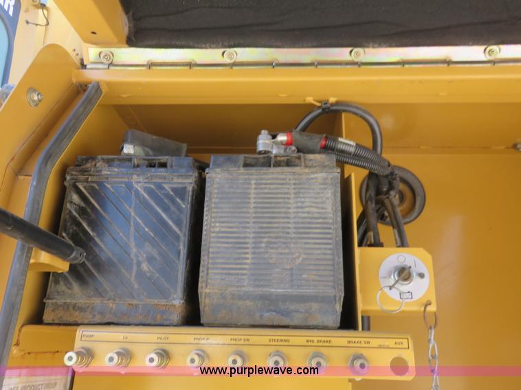 image for item K7107 2001 Caterpillar M315 rubber tire excavator