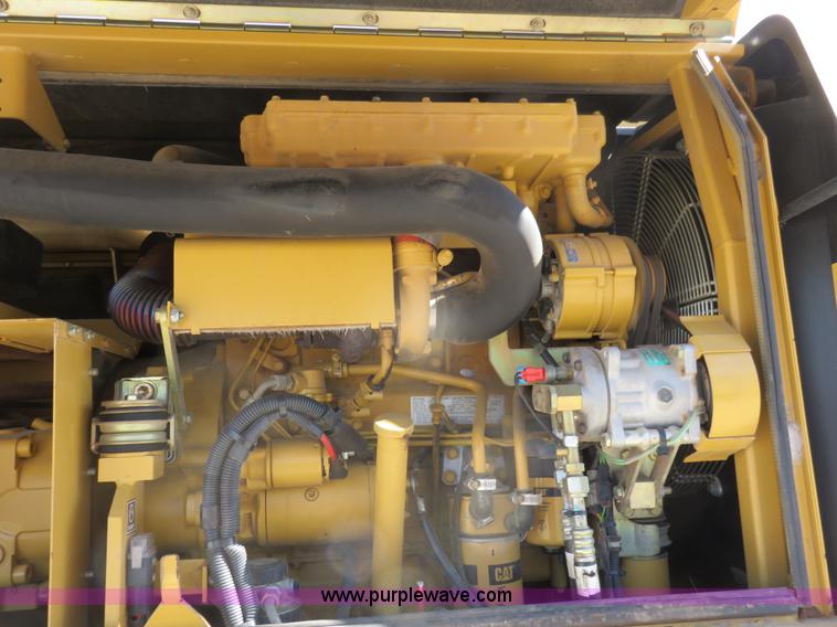 image for item K7107 2001 Caterpillar M315 rubber tire excavator