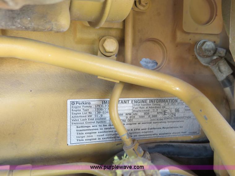 image for item K7107 2001 Caterpillar M315 rubber tire excavator