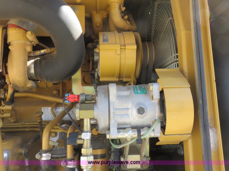 image for item K7107 2001 Caterpillar M315 rubber tire excavator