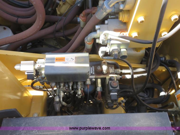 image for item K7107 2001 Caterpillar M315 rubber tire excavator