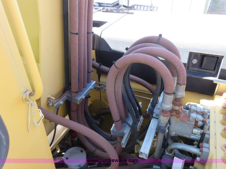 image for item K7107 2001 Caterpillar M315 rubber tire excavator