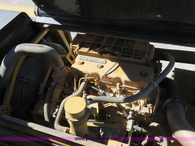 image for item K7107 2001 Caterpillar M315 rubber tire excavator