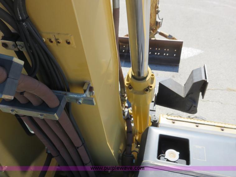 image for item K7107 2001 Caterpillar M315 rubber tire excavator