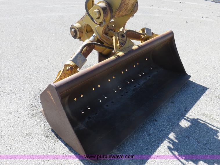 image for item K7107 2001 Caterpillar M315 rubber tire excavator