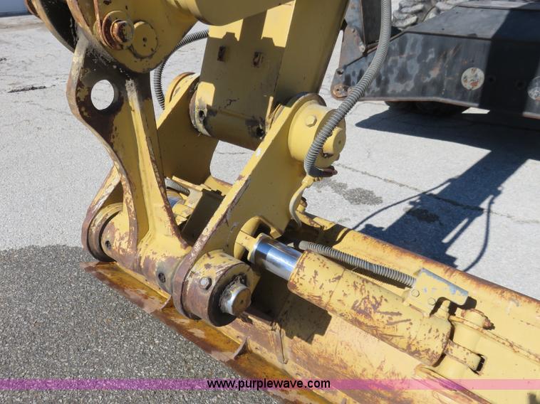 image for item K7107 2001 Caterpillar M315 rubber tire excavator