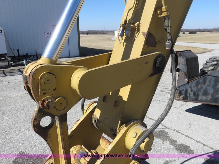 image for item K7107 2001 Caterpillar M315 rubber tire excavator