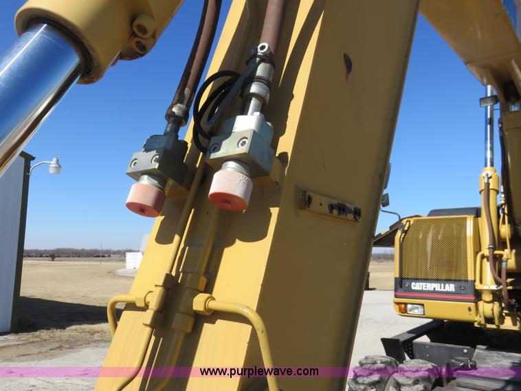 image for item K7107 2001 Caterpillar M315 rubber tire excavator