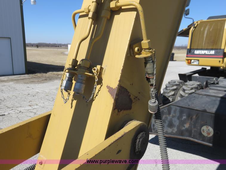 image for item K7107 2001 Caterpillar M315 rubber tire excavator