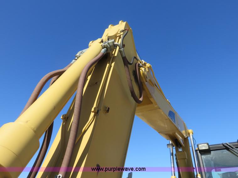 image for item K7107 2001 Caterpillar M315 rubber tire excavator