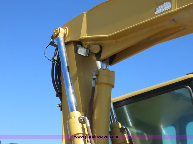 image for item K7107 2001 Caterpillar M315 rubber tire excavator