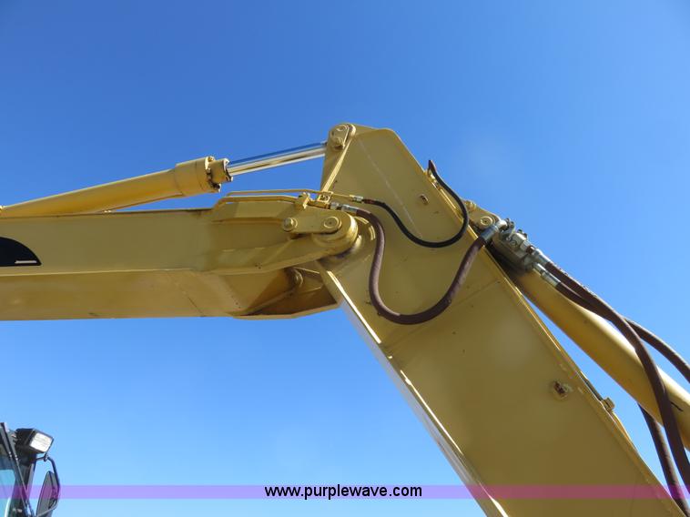 image for item K7107 2001 Caterpillar M315 rubber tire excavator