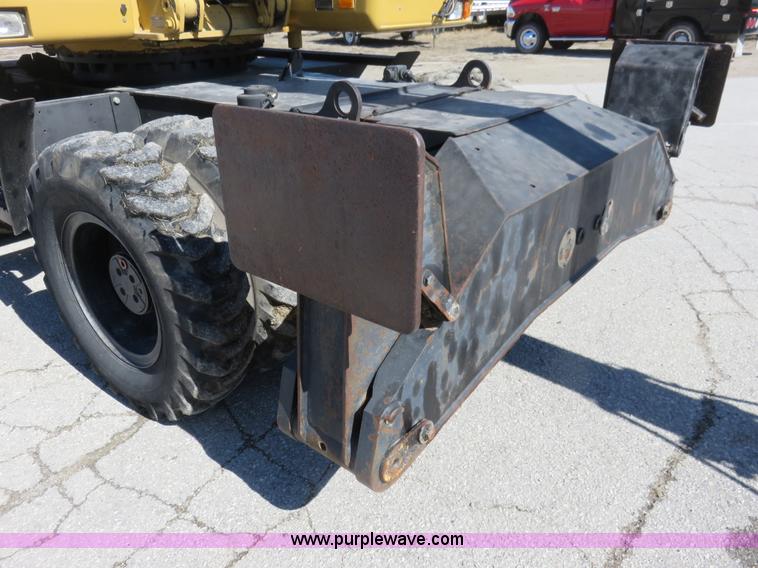 image for item K7107 2001 Caterpillar M315 rubber tire excavator