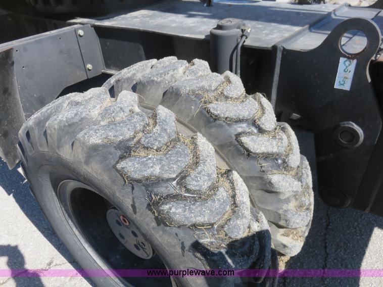 image for item K7107 2001 Caterpillar M315 rubber tire excavator